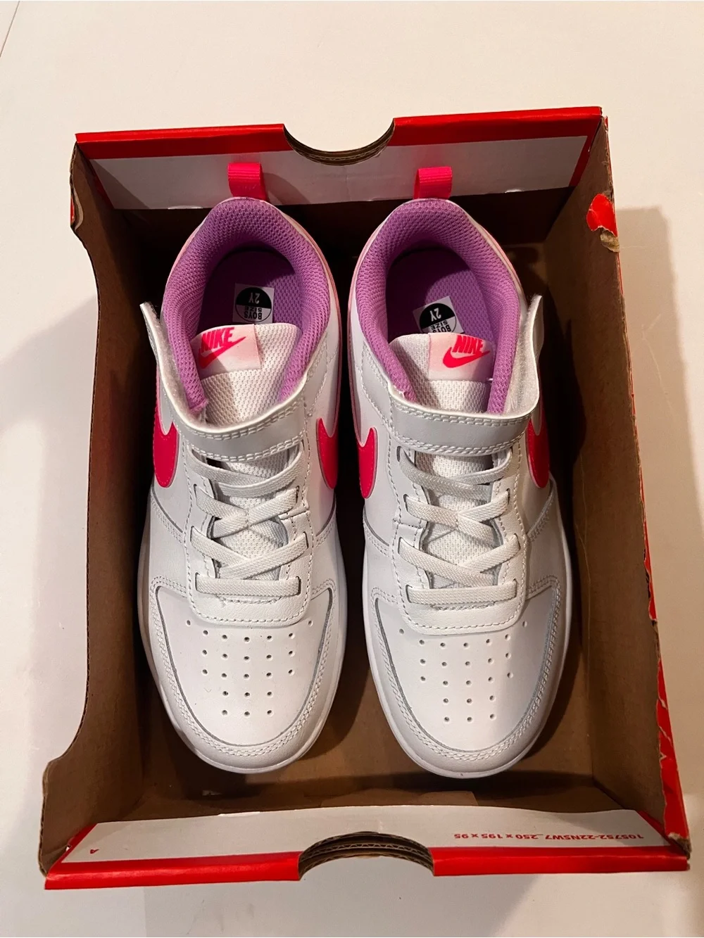 Nike Kids White Sneakers with Pink Accents